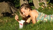 Cute blonde with natural breasts gets wet in the field