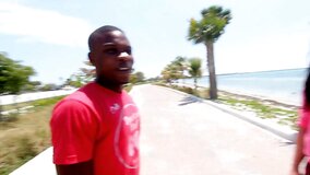 Sky is picked up by a black man and shown a good time