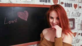 Pale redhead with an amazing figure is fingering herself