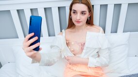 Cute Brunette Jerks Off Her Horny Pussy On The Bed